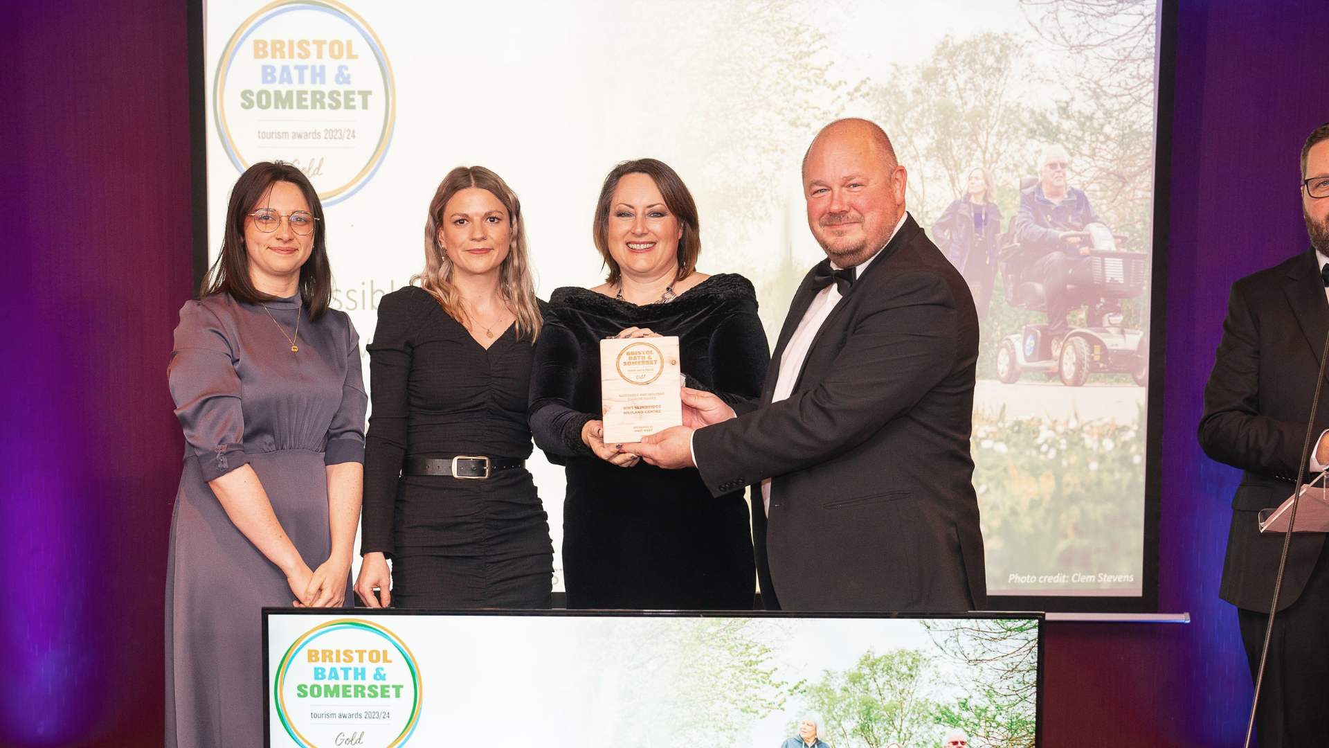 WWT Slimbridge receiving a Gold award at Bristol, Bath and Somerset Tourism Awards 2023 from Visit West's Jon Chamberlain